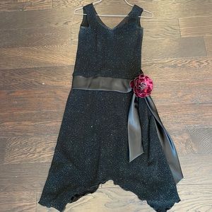 Sparkly black sleeveless dress with built-in silk sash and fabric flower